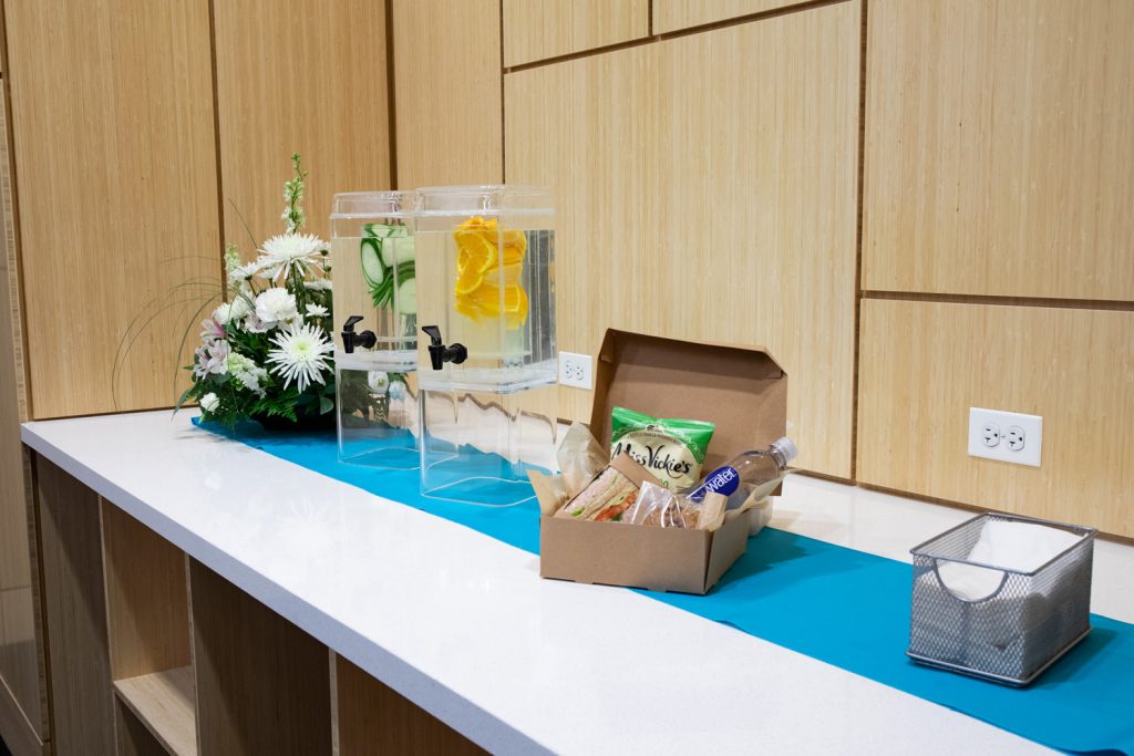 Catering Food at One Rotary Place. Photo of a deluxe spread of catered boxed lunches.